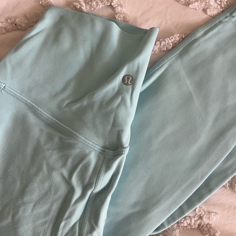 basically brand new leggings worn twice 
light blue lulu leggings 
size 6